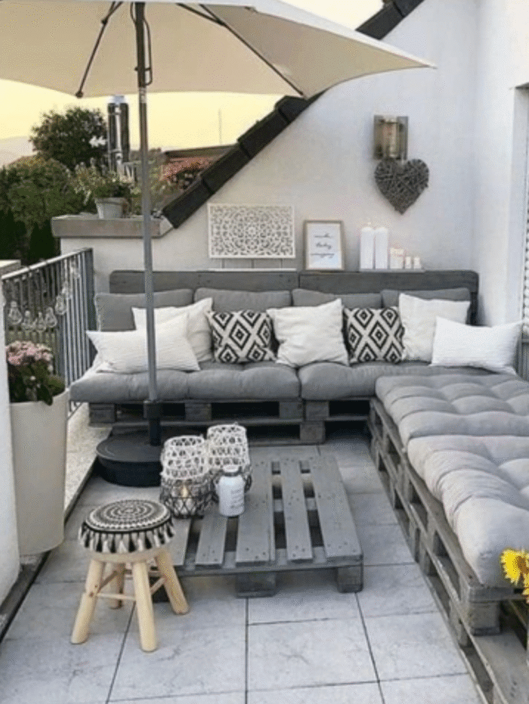 Cozy outdoor lounge seating area with cushions and pillows