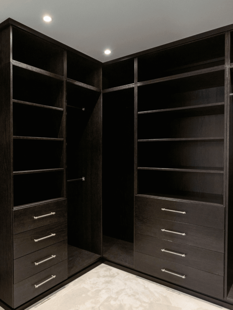 Customized Wardrobe with Dark Wood Finish and Spacious Storage