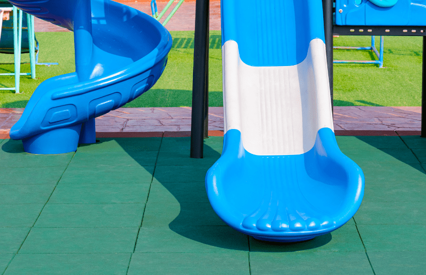 EPDM flooring under playground slide for child safety